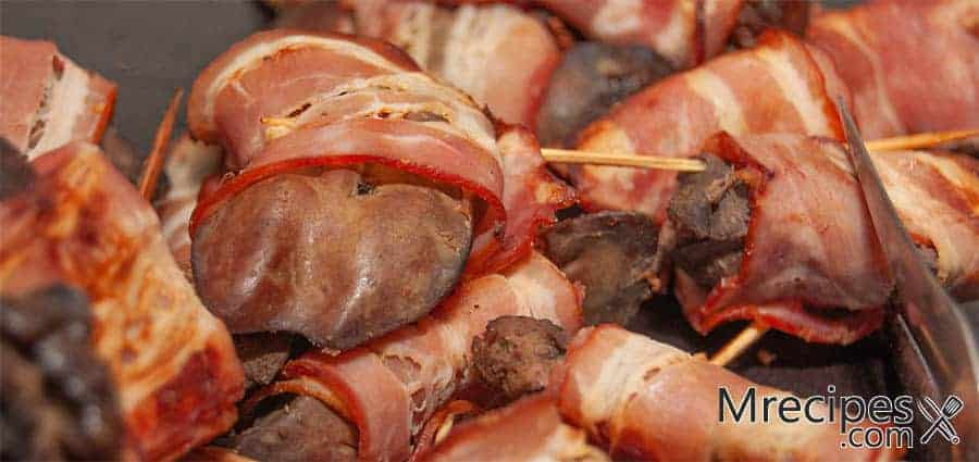 Smoked bacon wrapped chicken livers in toothpicks